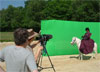 Setting up the shots in front of the green screen.