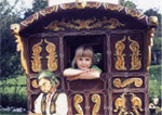 Miniature hand painted gypsy caravan.