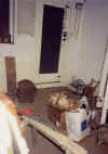 The hall and side door to number 89 High Street - now home to the Jeweller's and Music Shop displays.