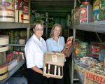 Sam Wigley (left) examines some of the 'mint condition' items with Lindsay Atfield from Yesterday's World.